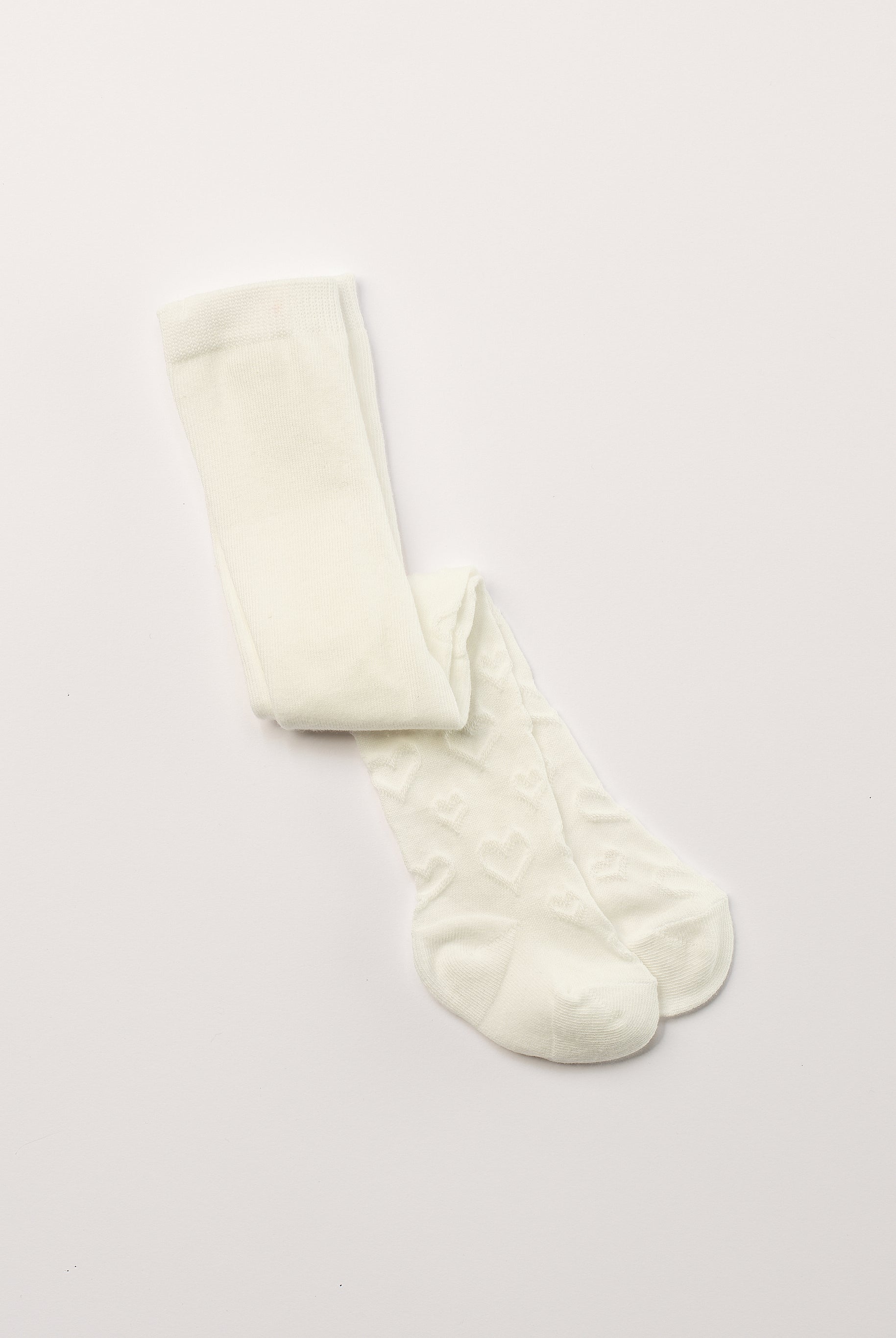 Ein zeitloser Klassiker und Grundausstattung für Ihr Baby Mädchen: Die cremefarbige Strumpfhose von AMIO Firenze. Diese Kinder-Strumpfhose ist vielseitig kombinierbar und verleiht jedem Outfit eine elegante Note durch die eingewebten Herzen. Die Strumpfhosen zeichnen sich durch einen besonders hohen Tragekomfort aus. Sie verrutschen nicht und halten ihre Form.
Höchste Qualität, bestes Preis-Leistungs-Verhältnis MADE IN ITALY.