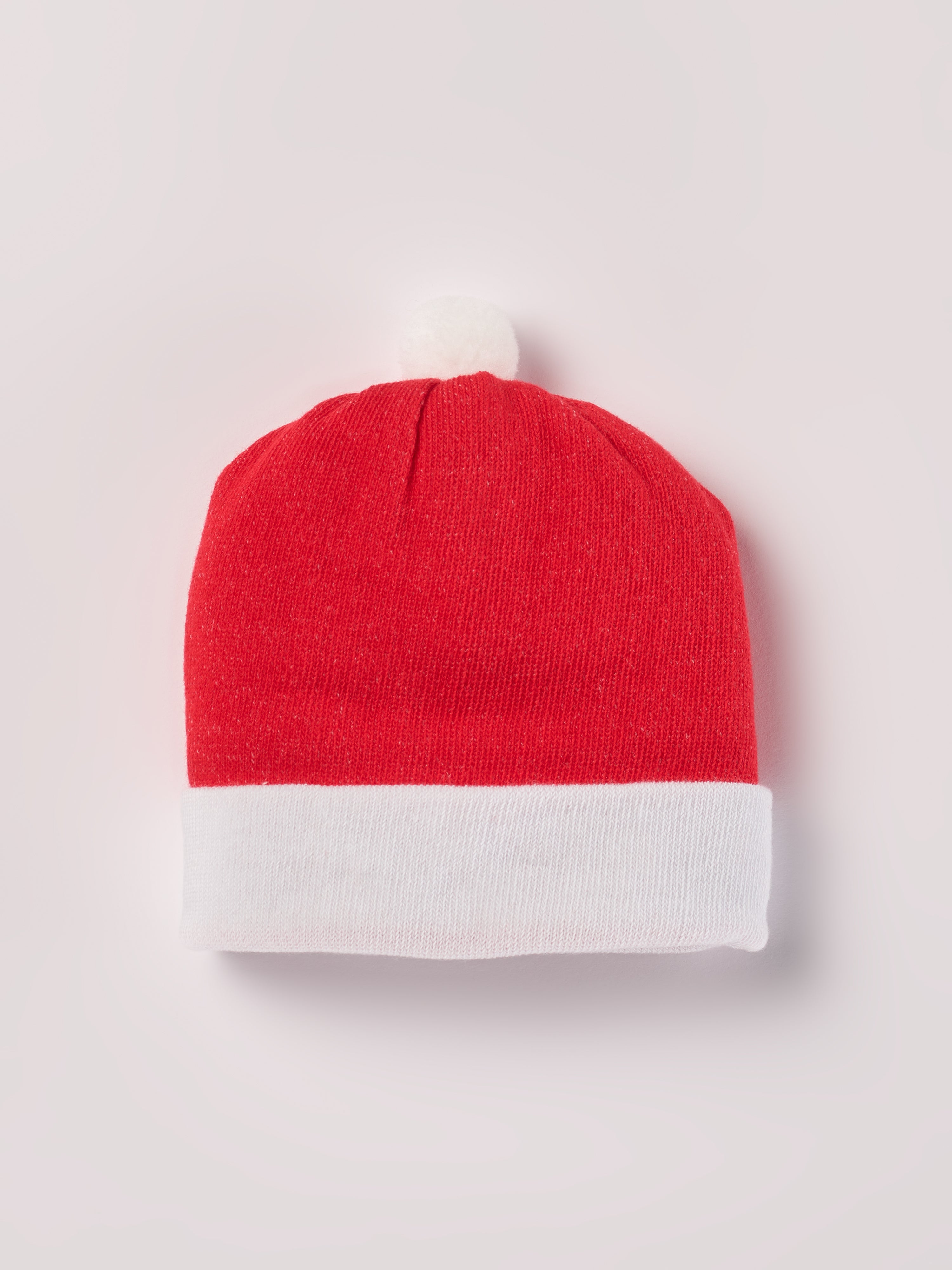 Die Santa Baby Strick Mütze ist die perfekte Kopfbedeckung für Ihr Baby . Mit ihrem Weihnachtsthema und weichen Strick sorgt sie für Wärme und eine festliche Stimmung in der Weihnachtszeit.