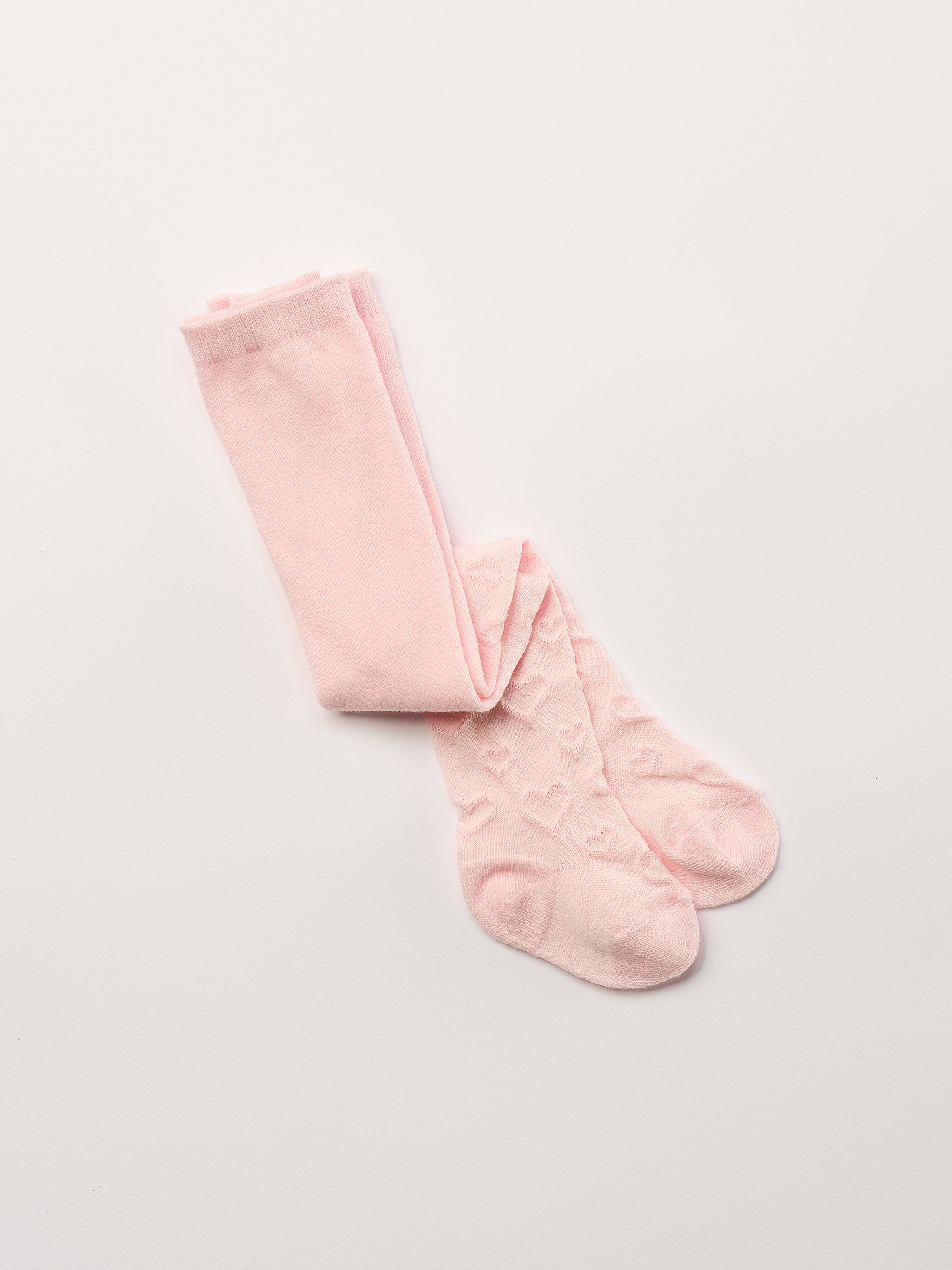 Ein zeitloser Klassiker und Grundausstattung für Ihr Baby Mädchen: Die cremefarbige Strumpfhose von&nbsp;AMIO Firenze. Diese Kinder-Strumpfhose ist vielseitig kombinierbar und verleiht jedem Outfit eine elegante Note durch die eingewebten Herzen. Die Strumpfhosen zeichnen sich durch einen besonders hohen Tragekomfort aus. Sie verrutschen nicht und halten ihre Form.

Höchste Qualität, bestes Preis-Leistungs-Verhältnis MADE IN ITALY.