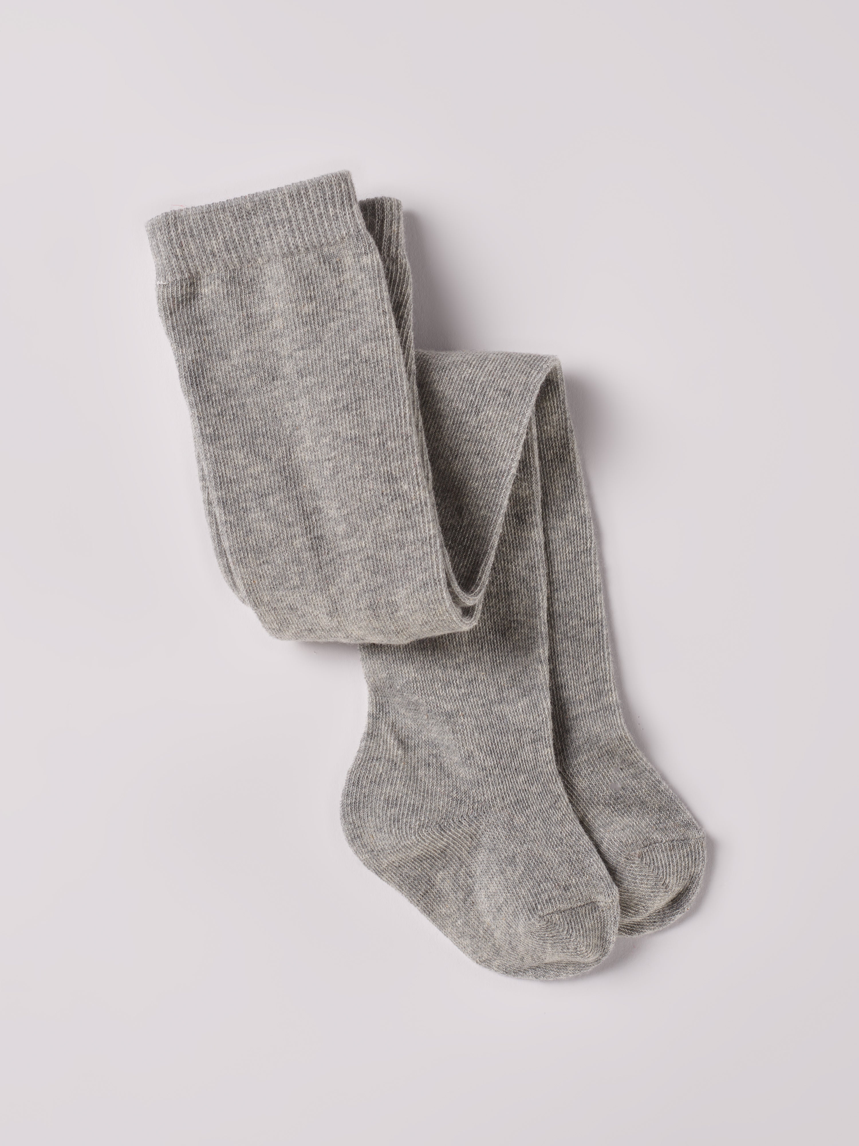 Ein zeitloser Klassiker und Grundausstattung für Ihr Kind: Die graue Strumpfhose von AMIO Firenze. Diese Kinder-Strumpfhose ist vielseitig kombinierbar und verleiht jedem Outfit eine elegante Note. Die Strumpfhosen zeichnen sich durch einen besonders hohen Tragekomfort aus. Sie verrutschen nicht und halten ihre Form.

Höchste Qualität, bestes Preis-Leistungs-Verhältnis MADE IN ITALY.