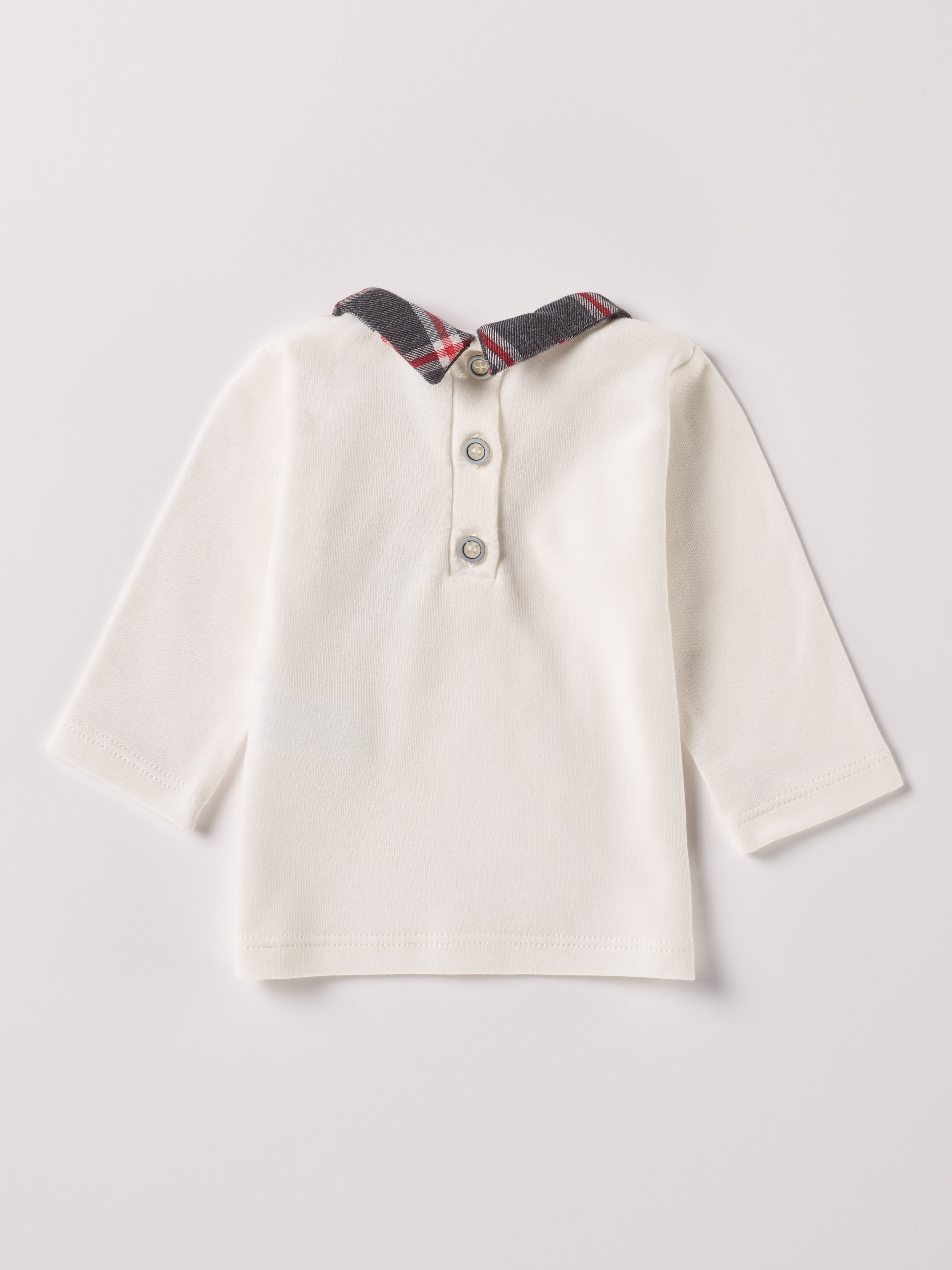 Das Interlock-Shirt für Baby Jungen von AMIO Firenze ist aus weicher Baumwolle gefertigt und bietet durch das Innenflanell ein äußerst angenehmes Tragegefühl. Der Tartan-Kragen und die Brusttasche verleihen dem Langarmshirt einen besonders stilvollen Touch.

Höchste Qualität, bestes Preis-Leistungs-Verhältnis MADE IN ITALY.