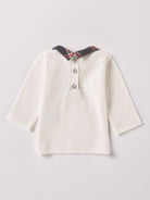 Das Interlock-Shirt für Baby Jungen von AMIO Firenze ist aus weicher Baumwolle gefertigt und bietet durch das Innenflanell ein äußerst angenehmes Tragegefühl. Der Tartan-Kragen und die Brusttasche verleihen dem Langarmshirt einen besonders stilvollen Touch.

Höchste Qualität, bestes Preis-Leistungs-Verhältnis MADE IN ITALY.